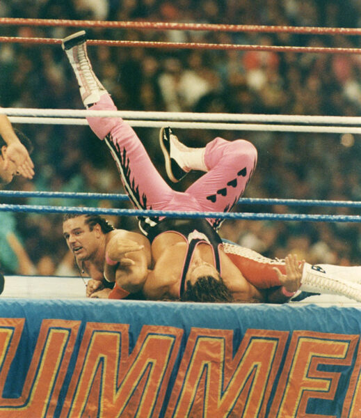 British Bulldog attempts a pinfall on Bret Hart at SummerSlam 1992.