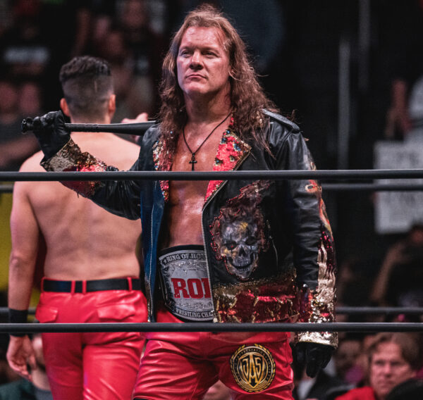 Chris Jericho wields a baseball bat and dons the ROH World heavyweight title belt