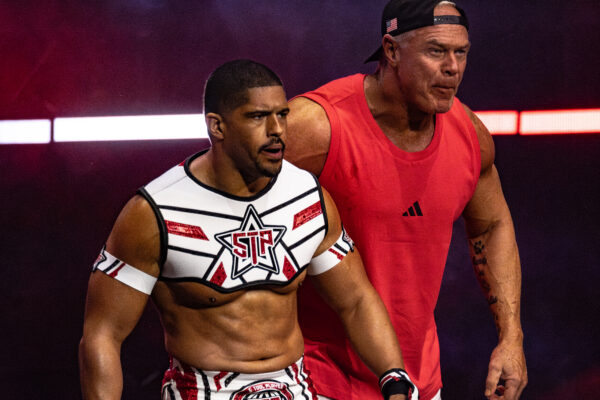 Anthony Bowens is flanked by Billy Gunn during his surprise return at AEW Dynasty 2025